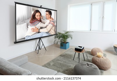 Scene Of Romantic Movie On Screen Of Video Projector At Home