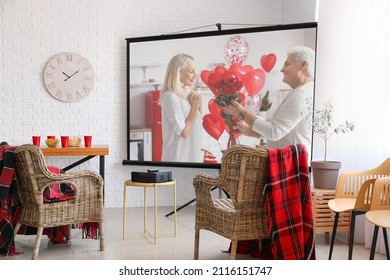 Scene Of Romantic Movie On Screen Of Video Projector At Home