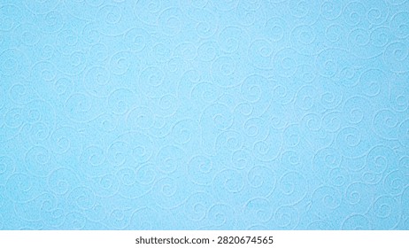 The scene shows a flat blue surface with light swirls across it, creating a patterned look. There are no notable features or objects present.