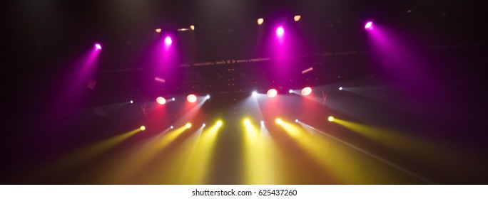 scene, stage light with colored spotlights and smoke - Shutterstock ID 625437260