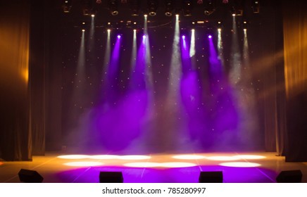 scene, stage light with colored spotlights and smoke - Shutterstock ID 785280997