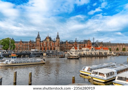 Scenery around Amsterdam city, Netherlands capital, in a clouded day, known for its artistic heritage, elaborate canal system and narrow houses with gabled facades, legacies of the city’s 17th-century