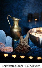 Scenery Baths Hammam, Spa Procedures. Copper Jug, Bowl With Burning Candles, White Towels