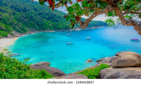 Scenery Of Beautiful Destination Beach, Group Of Speed Boats Parked On Sea Beach Waiting For Tourists, Top View From Hill Top, Similan Island, Travel In Thailand.