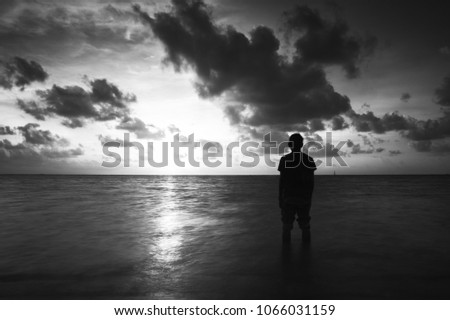 Similar – Foto Bild Silhouette von Mama und Baby bei Sonnenuntergang am Meer