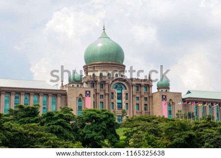 The scenery of Prime Minister's Office, Putrajaya, Malaysia with leaf green tree in the front