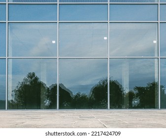 scenery reflection on brand new commercial office building glassy facade