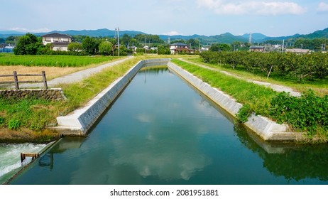 Scenery Of A Town With A Waterway