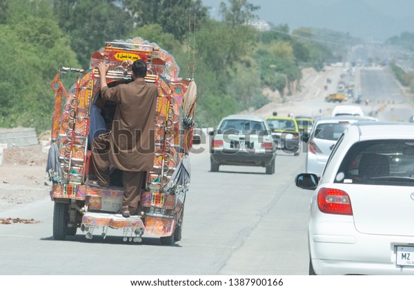 Scenes of traffics and public traveling when\
approaching the cities along the new silk road Islamabad-Hunza,\
Pakistan, 4/25/2014.