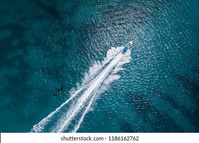 Scenic above bird's eye view of speedboat's wake in Caribbean sea, Dominican Republic