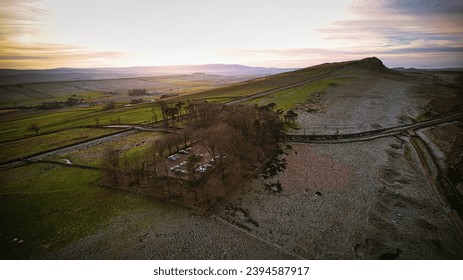 Scenic aerial landscape photo of the nature at Sycamore Gap, UK - Shutterstock ID 2394587917