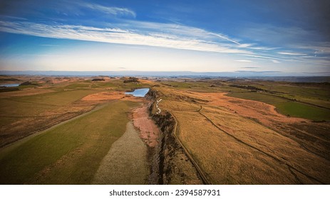 Scenic aerial landscape photo of the nature at Sycamore Gap, UK - Shutterstock ID 2394587931
