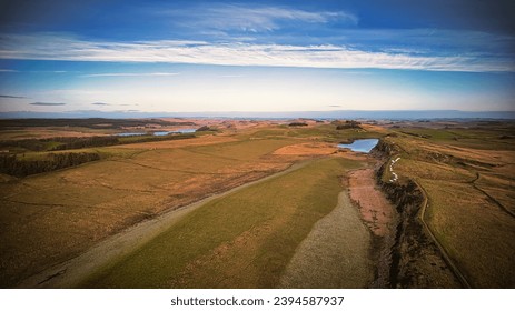 Scenic aerial landscape photo of the nature at Sycamore Gap, UK - Shutterstock ID 2394587937