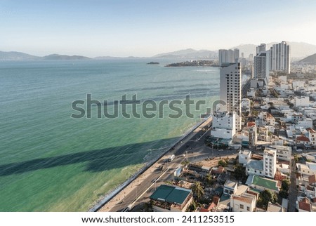 Scenic aerial view of Nha Trang city and Nha Trang Bay of the South China Sea in Khanh Hoa province, Vietnam. The coastal city is a popular tourist destination of Asia.