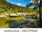 Scenic aerial view of Sculpture Falls via Barton Creek Greenbelt Trail in Austin Texas at summer