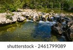 Scenic aerial view of Sculpture Falls via Barton Creek Greenbelt Trail in Austin Texas at summer