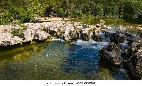 Scenic aerial view of Sculpture Falls via Barton Creek Greenbelt Trail in Austin Texas at summer