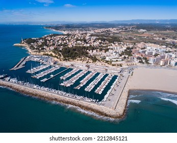 Scenic Aerial View Of Seascape With White Pleasure Yachts Moored In Port Off Coast Of Small Spanish Town Of Torredembarra