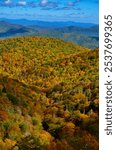 Scenic autumn landscape of the Blue Ridge Mountains with vibrant fall foliage near Asheville, North Carolina.