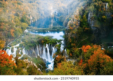 Scenic Autumn Waterfall in Serene Forest Setting of Plitvice Lakes National Park - Powered by Shutterstock