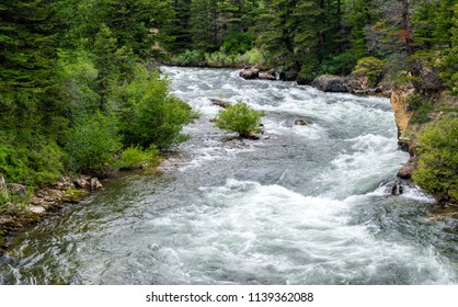 scenic Boulder River flowing through lush forests near Big Timber, Montana
