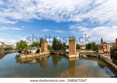 Scenic Canal and Historic Tower in Strasbourg