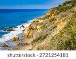Scenic coastal view of dramatic cliffs and rocky shoreline at El Matador State Beach in California