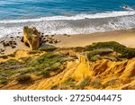 Scenic coastal view of dramatic cliffs and rocky shoreline at El Matador State Beach in California