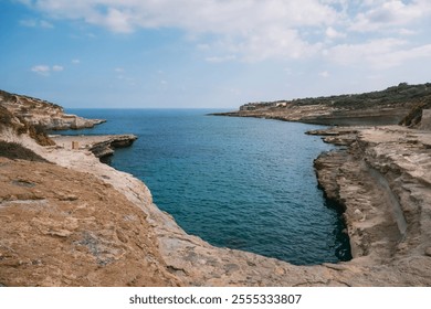 Scenic Coastal View of Malta with Clear Blue Waters and Rocky Cliffs - Powered by Shutterstock