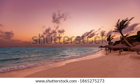 Scenic dawn on a desert beach of Maldives island.Relax on tropical shore.