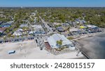 Scenic drone view of coastal Downtown Gulfport, Florida looking up Beach Blvd