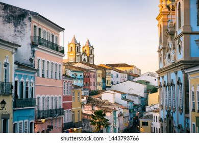 Scenic dusk view of a historic plaza surrounded by colonial buildings in the tourist district of Pelourinho, in Salvador, Bahia, Brazil