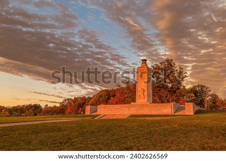 The scenic Eternal Light Peace Memorial against the sunset sky