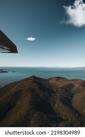 Scenic Flight Over The Lush Green Hills Of The Whitsunday Islands And The Ocean, Queensland, Australia