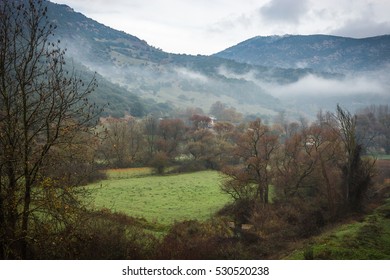 Scenic foggy autumn landscape in Vouraikos gorge near railway, Peloponnesse, Greece - Shutterstock ID 530520238
