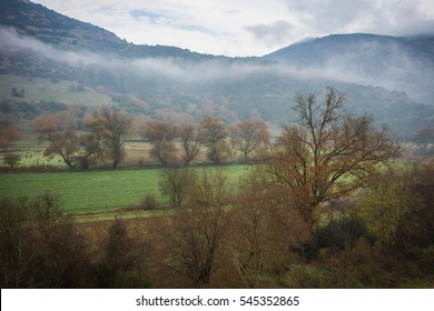 Scenic foggy autumn landscape in Vouraikos gorge near railway, Peloponnesse, Greece - Shutterstock ID 545352865