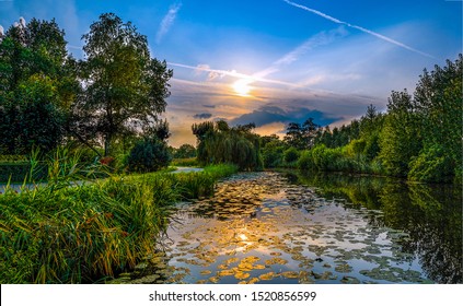 Scenic forest river reflection at sunset - Powered by Shutterstock