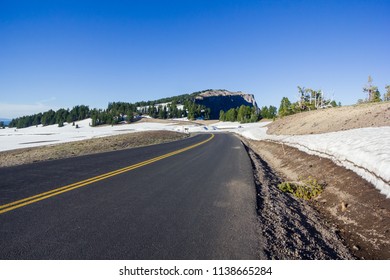 A Scenic Highway (Rim Drive) In Crater Lake National Park, Oregon, USA