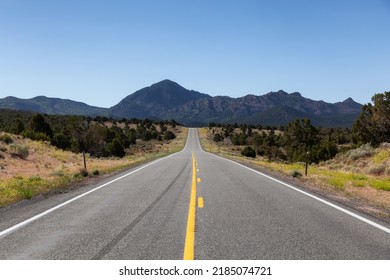 Scenic Highway Route In The Desert With American Mountain Landscape. Sunny Morning. Utah, United States Of America.