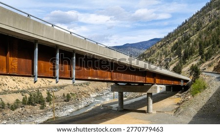 A scenic journey through BC's dramatic transition - from rushing glacial waters of Kicking Horse Canyon to the dry, rugged landscapes of the Thompson river near Kamloops where rail, river, and highway wind together through vast canyon terrain.