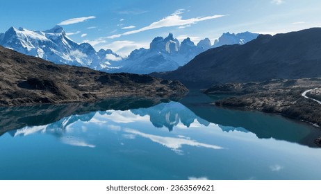 Scenic Lake Of Torres Del Paine In Punta Arenas Chile. Snowy Mountains. Glacier Landscape. Punta Arenas Chile. Winter Background. Scenic Lake At Torres Del Paine In Punta Arenas Chile.