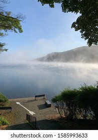 Scenic Lake View Bench Cooperstown NY Blue Sky Foggy