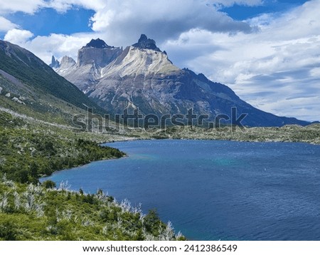 Scenic landscape of mountains, lake and wild nature in Torres del Paine National Park, Patagonia, Chile