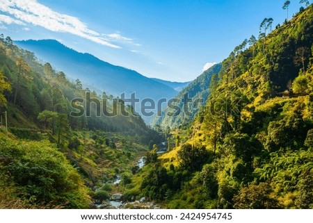 Scenic landscape panoramic view of the forested Himalaya mountains, Himachal Pradesh state in India