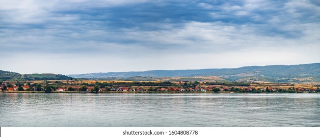 Scenic Landscape With Red Roofs Of The Orsova City In Southwestern Of Mehedinti County, Romania. It Is Situated Just Above The Iron Gates, On The Spot Where The Cerna River Meets The Danube.