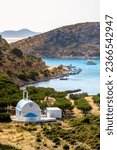 Scenic landscape with a white church of Agios Ioannis and a small harbor on Lipsi island, Greece