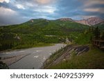 A scenic late Spring view of the Nenana River and surrounding mountains in Denali National Park in Alaska.