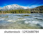 Scenic Lautersee Lake in the alp mountains Mittenwald, Germany with ice on the water surface