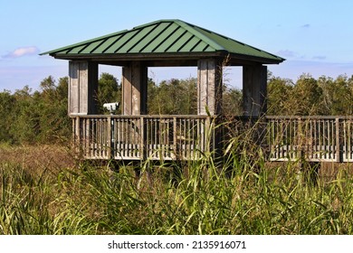 Scenic Louisiana birding and wildlife watching from public recreation viewing deck equipped with scope at Cameron Prairie National Wildlife Refuge - Shutterstock ID 2135916071