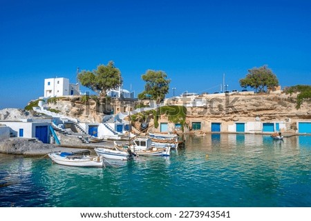Scenic Mandrakia village (traditional Greek village by the sea, the Cycladic-style) with sirmata - traditional fishermen's houses, Milos island, Cyclades, Greece. Foto stock © 